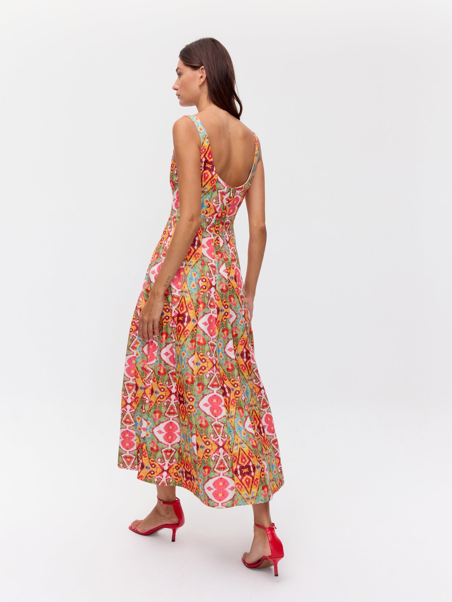 MIOH | SOLSTICIO IKAT - Vestido corsé midi con vuelo ikat para invitada de boda